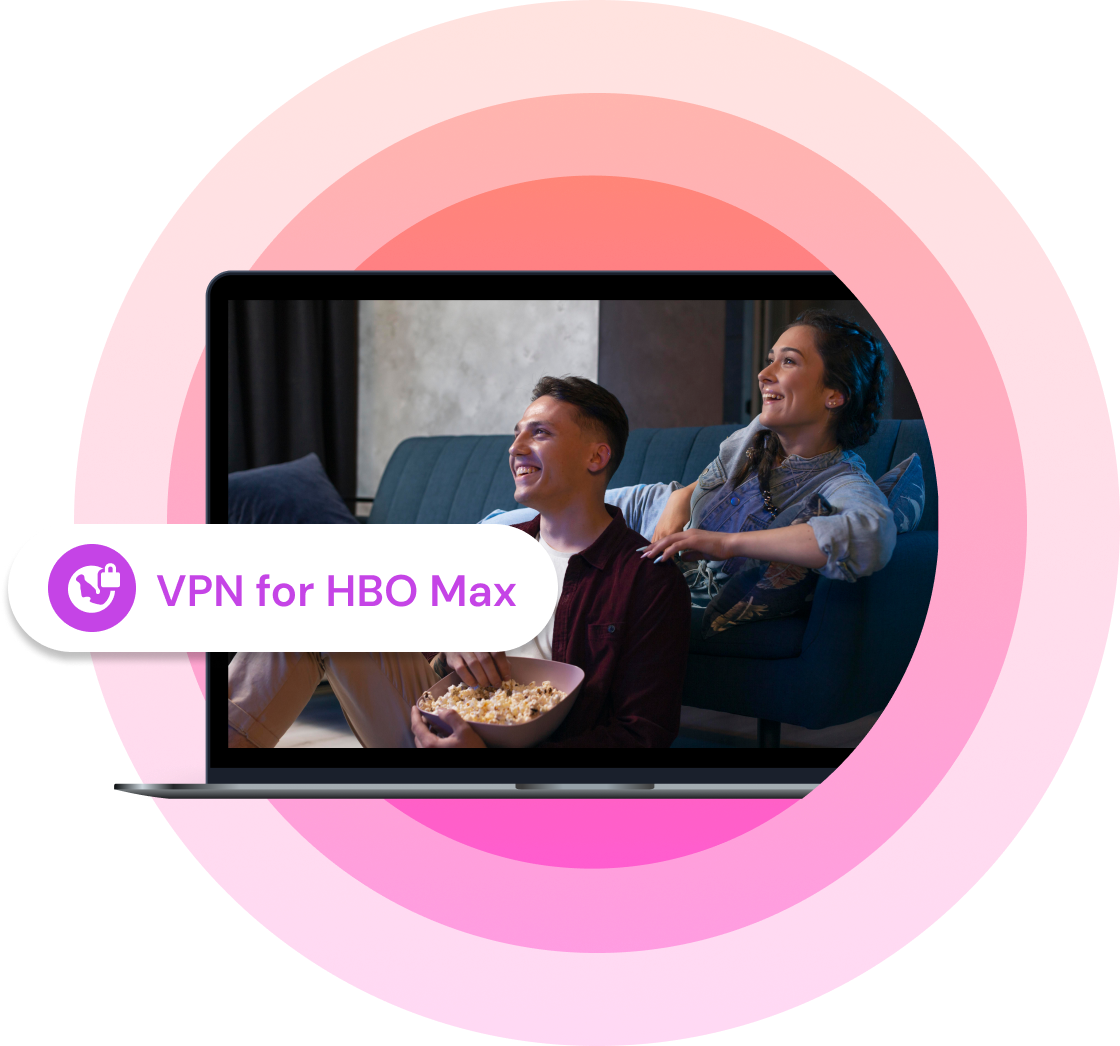 Laptop screen showing a smiling couple sitting on a couch, watching a show and sharing popcorn, with an overlay label reading “VPN for HBO Max” and a shield icon, set against a pink-to-purple gradient background.